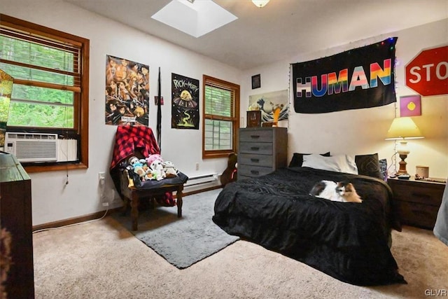 bedroom featuring cooling unit, carpet flooring, a baseboard heating unit, and a skylight