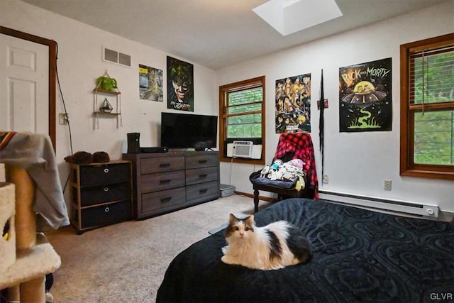 carpeted bedroom featuring cooling unit, a skylight, and baseboard heating