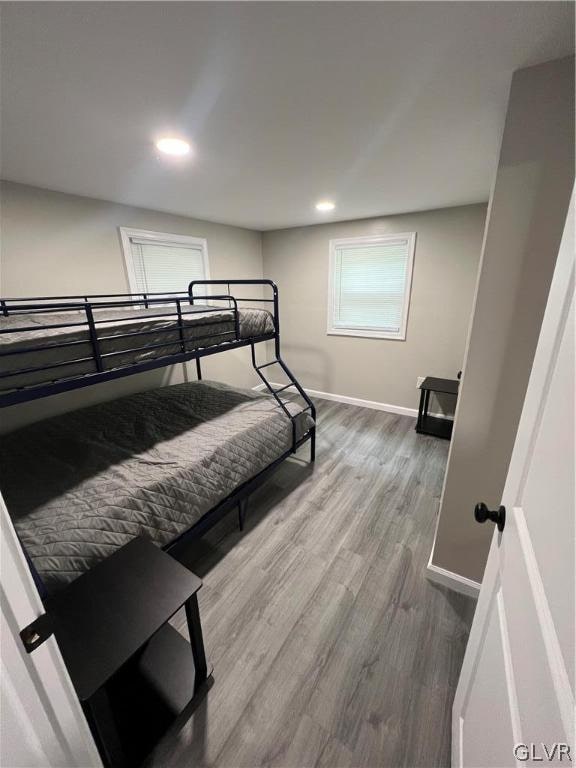 bedroom with wood-type flooring