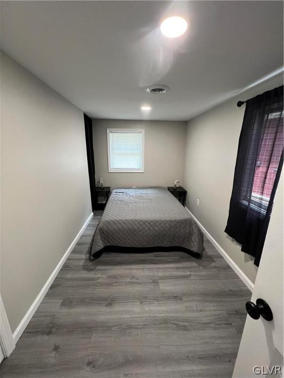 bedroom featuring hardwood / wood-style flooring