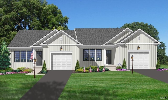 view of front of home with a garage and a front yard