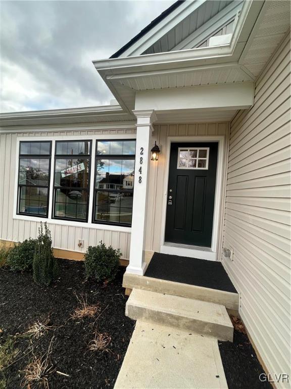 2848 Norton Ave Unit 4, Palmer Twp, PA 18045 - doorway to property featuring board and batten siding