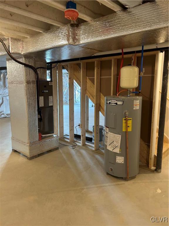 basement featuring electric water heater