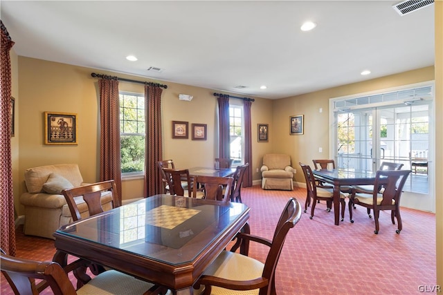 dining room featuring carpet floors