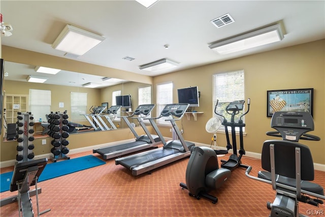 workout area featuring carpet