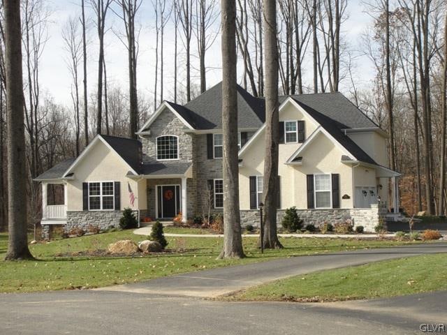 view of front of home with a front yard