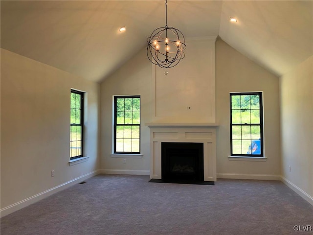 unfurnished living room featuring high vaulted ceiling, a chandelier, and dark carpet