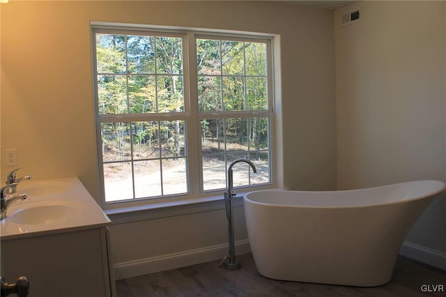 living area featuring dark hardwood / wood-style floors and sink