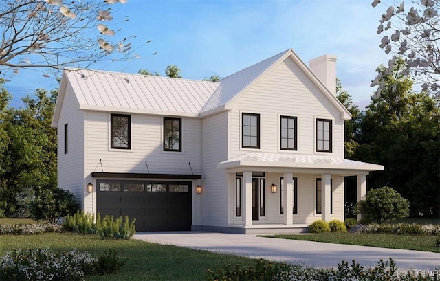 view of front of home with a garage and covered porch