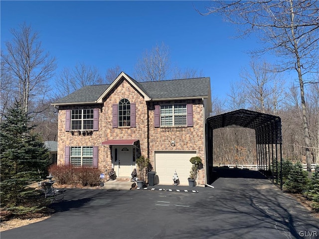 view of front of property with a garage and a carport