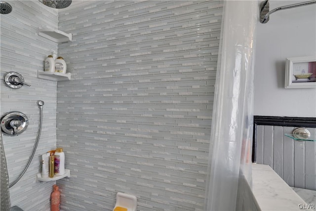 room details with a tile shower