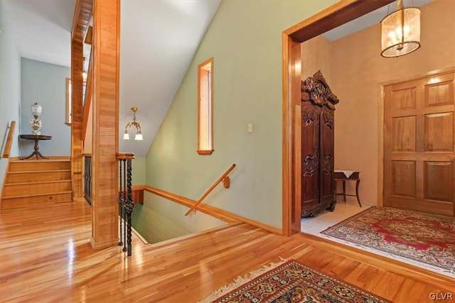 interior space featuring a notable chandelier and hardwood / wood-style floors