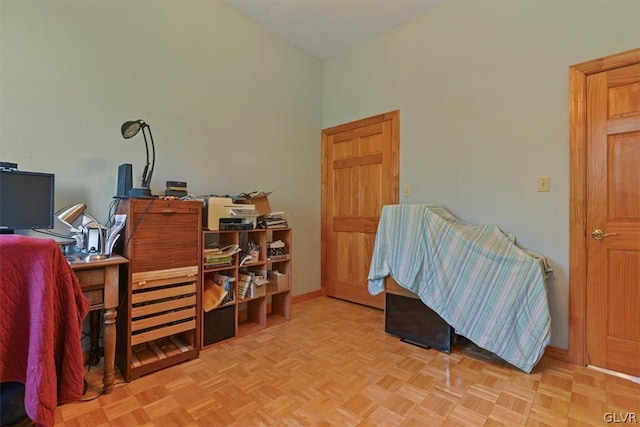 home office with light parquet floors