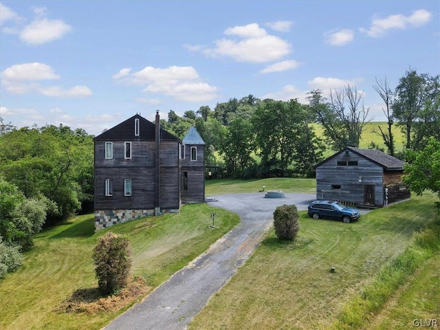 exterior space featuring a yard