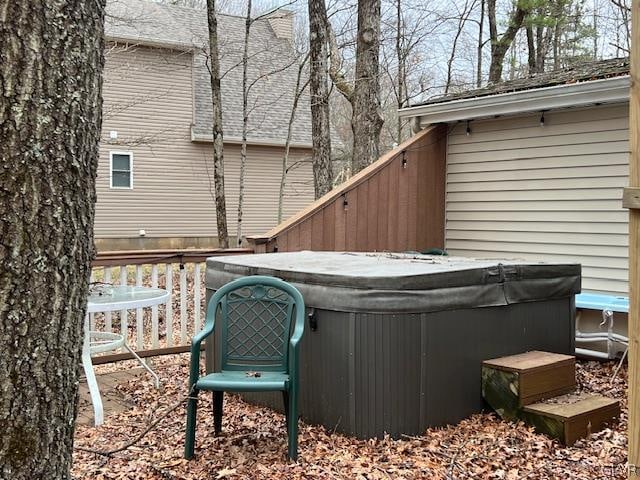 view of patio / terrace with a hot tub