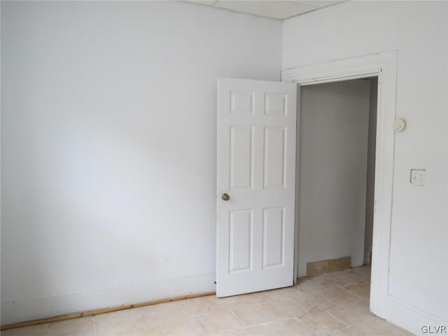 spare room with light tile patterned flooring