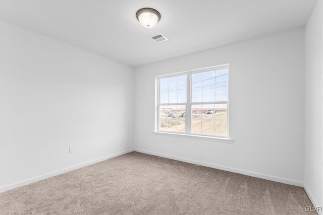 empty room featuring carpet