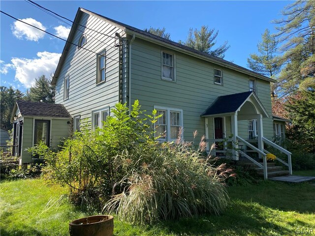 1058 Rte 209, Polk Twp, PA 18331 - back of property with a lawn