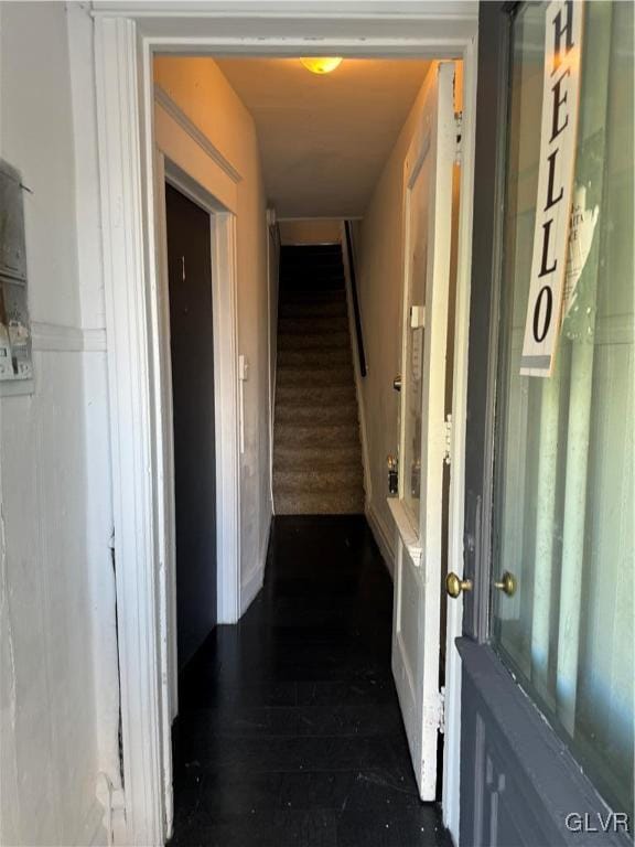 hallway featuring dark wood-type flooring