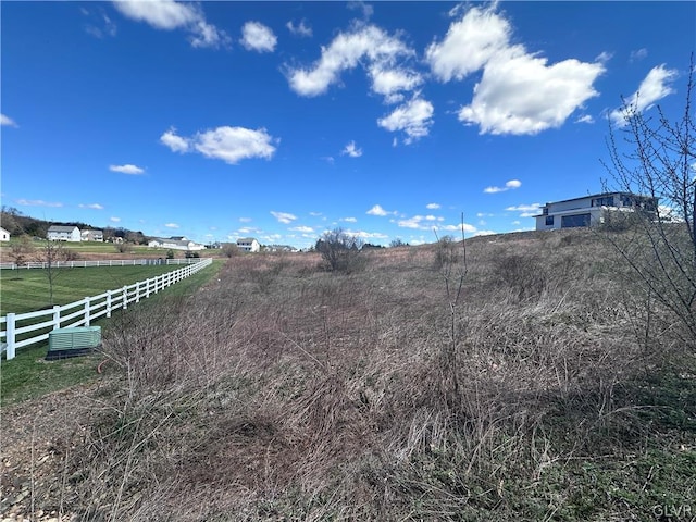 exterior space with a rural view