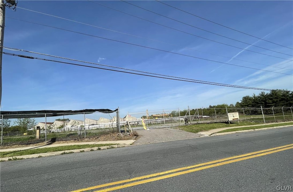 view of road featuring curbs and sidewalks