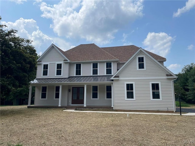 2059 Sunrise Dr Lot 7, Springfield Twp, PA 18036 - view of front facade with a standing seam roof, a porch, metal roof, roof with shingles, and french doors