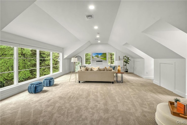 carpeted bedroom featuring vaulted ceiling