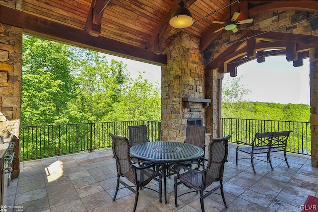 view of patio featuring ceiling fan