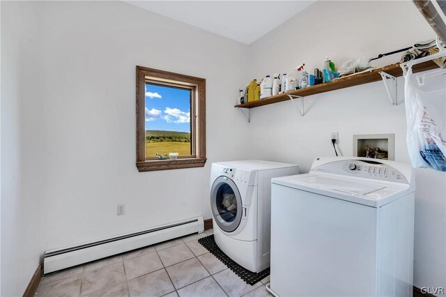 laundry room with light tile patterned floors, laundry area, washer and clothes dryer, and a baseboard radiator