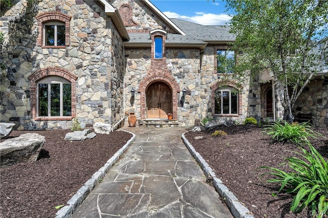 view of front of home featuring stone siding