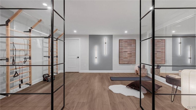 home office with hardwood / wood-style floors