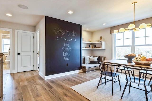 dining area with light wood-type flooring