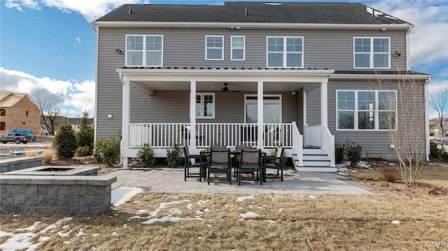 back of house with a patio area and ceiling fan