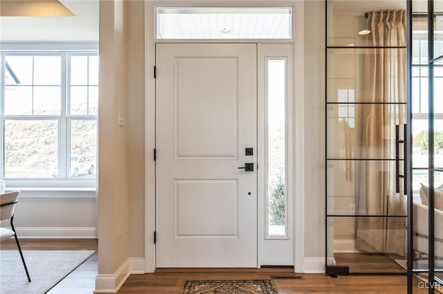 foyer featuring hardwood / wood-style flooring