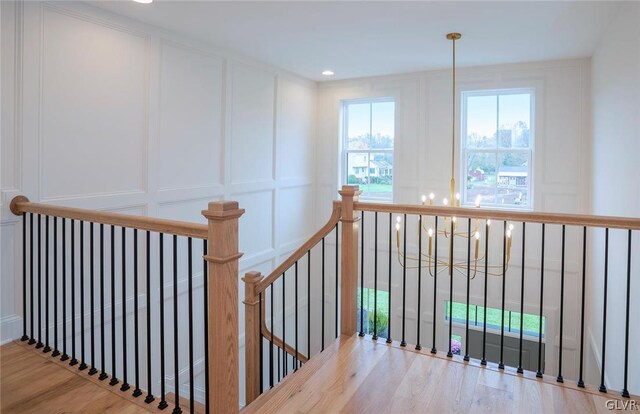 staircase featuring light wood-type flooring