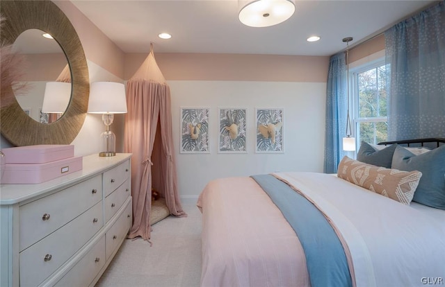 bedroom with light colored carpet