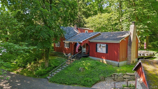 view of front of house with a chimney