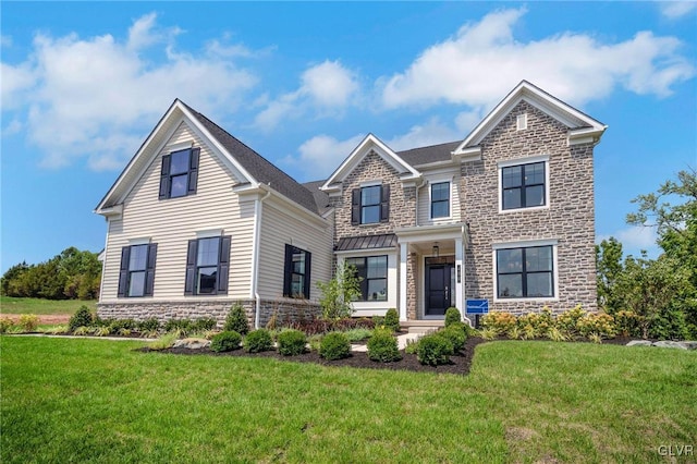 view of front of home with a front yard