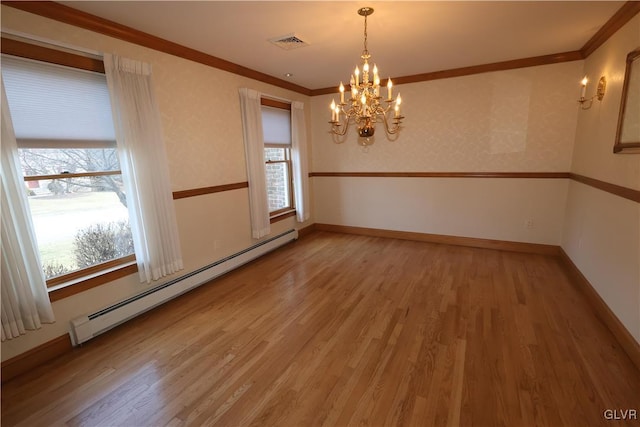 unfurnished dining area featuring a notable chandelier, hardwood / wood-style flooring, crown molding, and a baseboard radiator