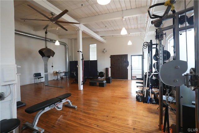 workout area with wood ceiling, hardwood / wood-style floors, and ceiling fan