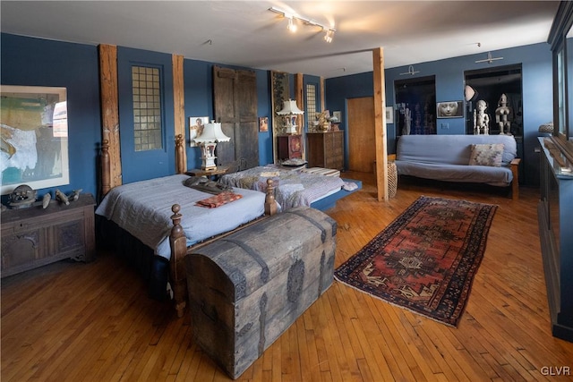 bedroom featuring hardwood / wood-style flooring