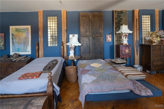 bedroom with wood finished floors