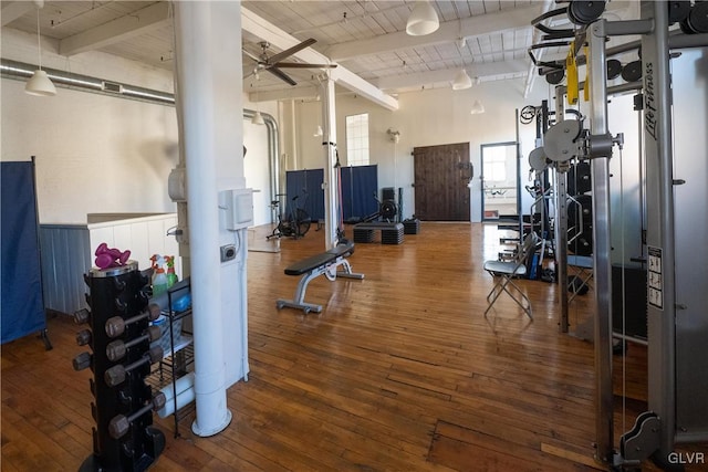 workout area with wooden ceiling, ceiling fan, and hardwood / wood-style flooring