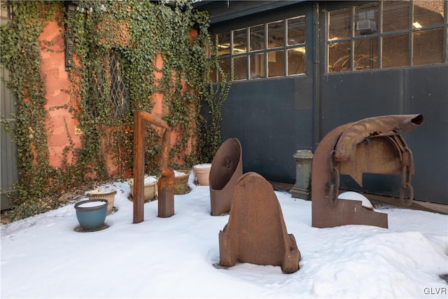 view of snow covered patio
