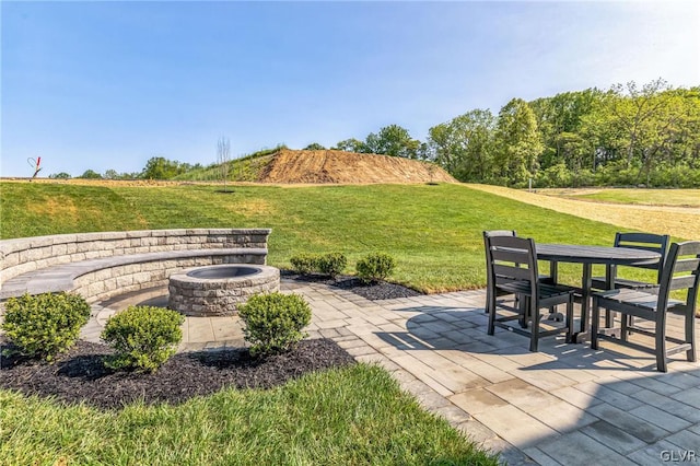 view of patio featuring a fire pit