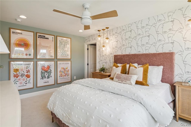 bedroom with light carpet and ceiling fan