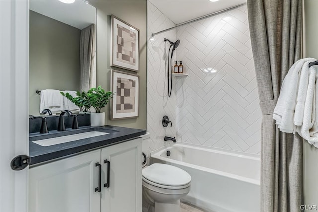 full bathroom with vanity, toilet, and shower / tub combo with curtain