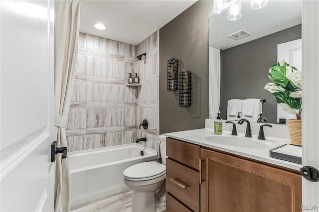 full bathroom featuring tile patterned floors, vanity, toilet, and shower / bathtub combination with curtain