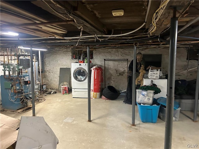 basement featuring washer and clothes dryer