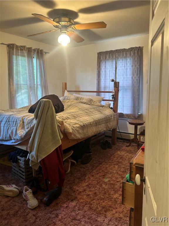 bedroom with carpet flooring and ceiling fan